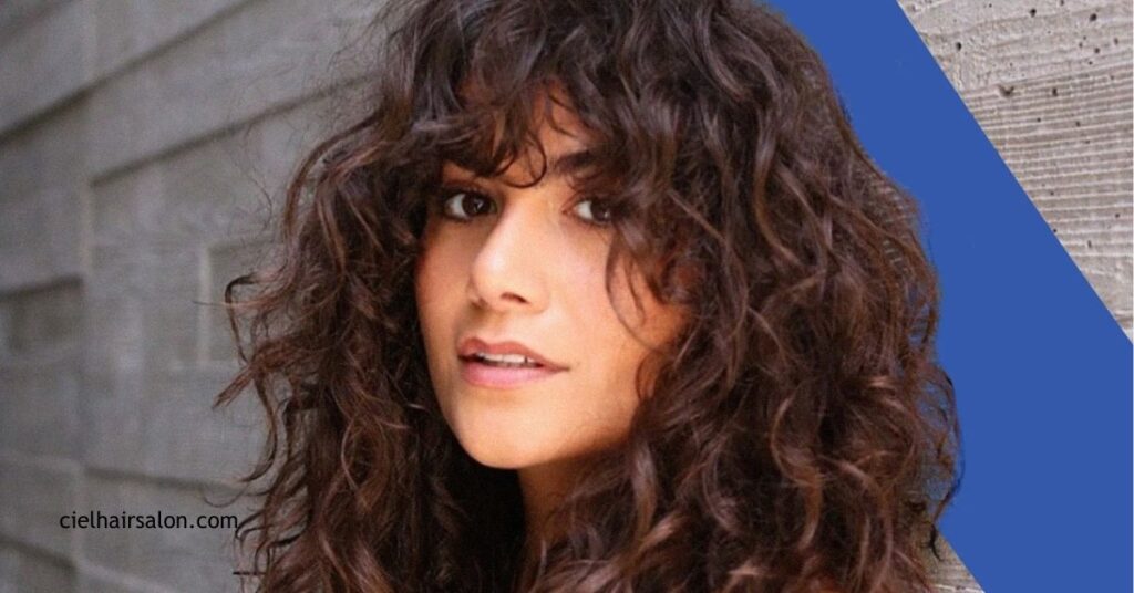 10 Low Maintenance Medium Length Hairstyles with Bangs You'll Love 5 Curly Medium Length with Fringe